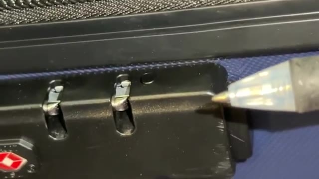 Pressing the reset button with a pen tip