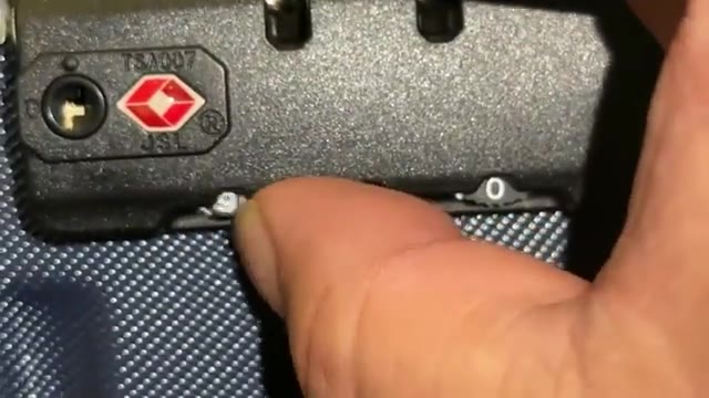 Rolling the combination dials to a new code